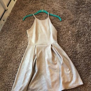 gold soprano dress. size small